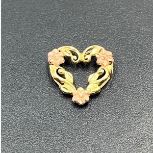 10k Two-Toned Yellow Rose Gold Diamond Cut Heart and Flower Charm pendant